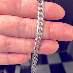 Approx 1/4 inch link Italian .925 silver chain. 22.5” unique cuban-cut links